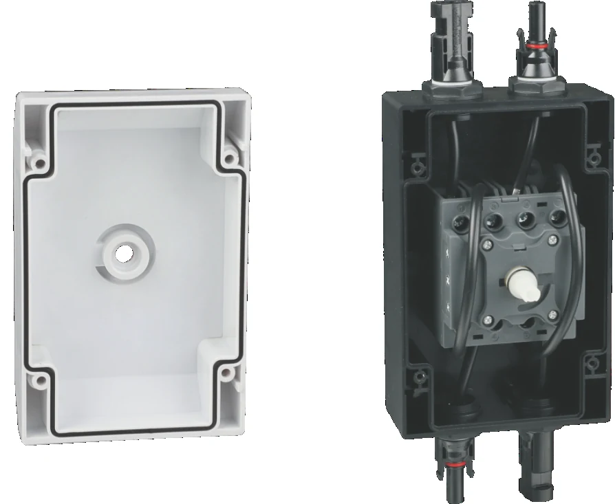 GF40 IP66 enclosure opened to show internal DC isolator mechanism and cable connection route